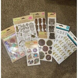 Various stickers, die cutouts and rub on transfers
